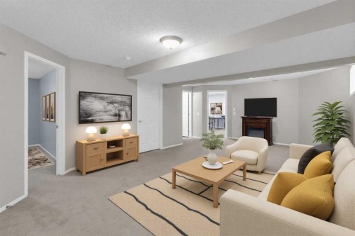 24 Evansbrooke Point Nw, Calgary, AB - Indoor Photo Showing Living Room
