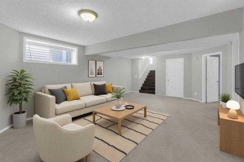 24 Evansbrooke Point Nw, Calgary, AB - Indoor Photo Showing Living Room
