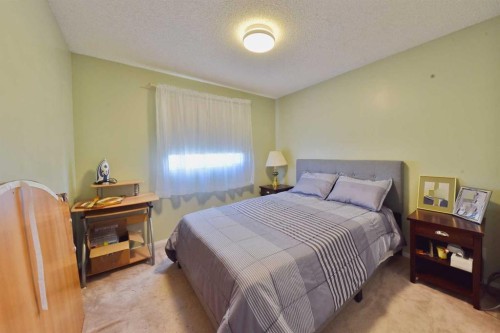 105 Coral Springs Close Ne, Calgary, AB - Indoor Photo Showing Bedroom