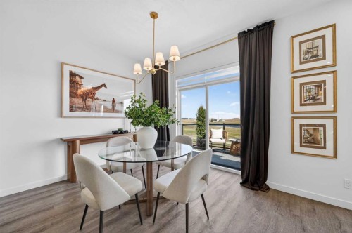 85 Boulder Creek Manor Se, Langdon, AB - Indoor Photo Showing Dining Room