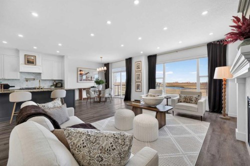 85 Boulder Creek Manor Se, Langdon, AB - Indoor Photo Showing Living Room