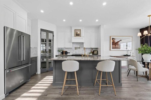85 Boulder Creek Manor Se, Langdon, AB - Indoor Photo Showing Kitchen With Upgraded Kitchen