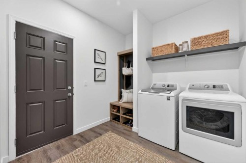 85 Boulder Creek Manor Se, Langdon, AB - Indoor Photo Showing Laundry Room