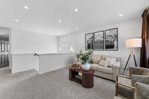 85 Boulder Creek Manor Se, Langdon, AB - Indoor Photo Showing Living Room