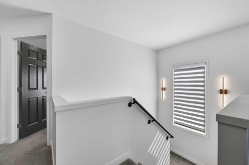 85 Boulder Creek Manor Se, Langdon, AB - Indoor Photo Showing Other Room