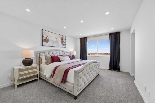 85 Boulder Creek Manor Se, Langdon, AB - Indoor Photo Showing Bedroom