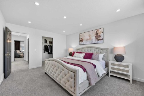 85 Boulder Creek Manor Se, Langdon, AB - Indoor Photo Showing Bedroom
