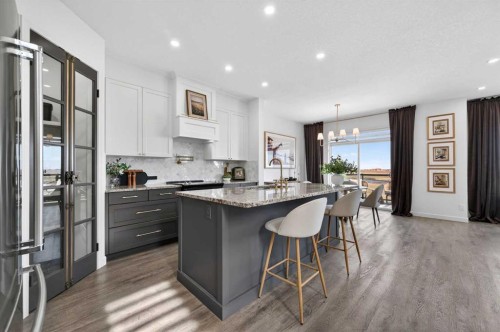 85 Boulder Creek Manor Se, Langdon, AB - Indoor Photo Showing Kitchen With Upgraded Kitchen
