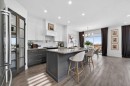 85 Boulder Creek Manor Se, Langdon, AB  - Indoor Photo Showing Kitchen With Upgraded Kitchen 