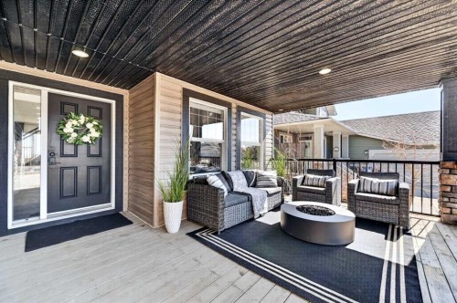 85 Boulder Creek Manor Se, Langdon, AB - Outdoor With Deck Patio Veranda With Exterior
