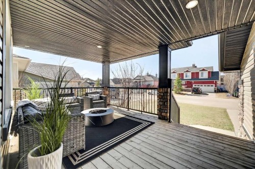 85 Boulder Creek Manor Se, Langdon, AB - Outdoor With Deck Patio Veranda With Exterior