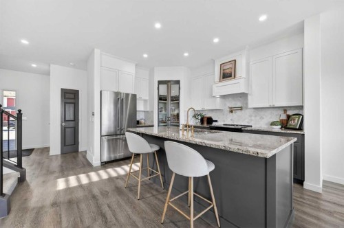 85 Boulder Creek Manor Se, Langdon, AB - Indoor Photo Showing Kitchen With Upgraded Kitchen