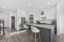 85 Boulder Creek Manor Se, Langdon, AB  - Indoor Photo Showing Kitchen With Upgraded Kitchen 