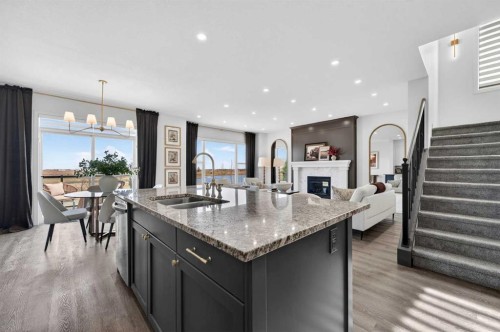 85 Boulder Creek Manor Se, Langdon, AB - Indoor Photo Showing Kitchen With Double Sink With Upgraded Kitchen