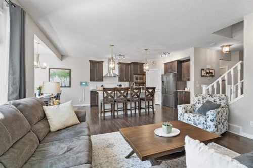 49 Kingsbridge Place Se, Airdrie, AB - Indoor Photo Showing Living Room