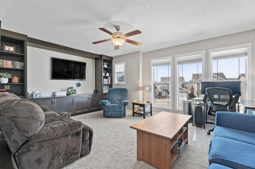 49 Kingsbridge Place Se, Airdrie, AB - Indoor Photo Showing Living Room