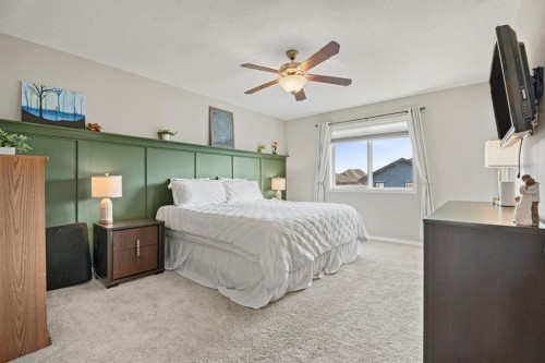 49 Kingsbridge Place Se, Airdrie, AB - Indoor Photo Showing Bedroom