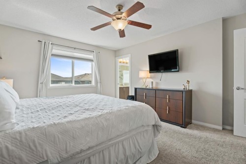 49 Kingsbridge Place Se, Airdrie, AB - Indoor Photo Showing Bedroom