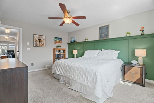 49 Kingsbridge Place Se, Airdrie, AB - Indoor Photo Showing Bedroom