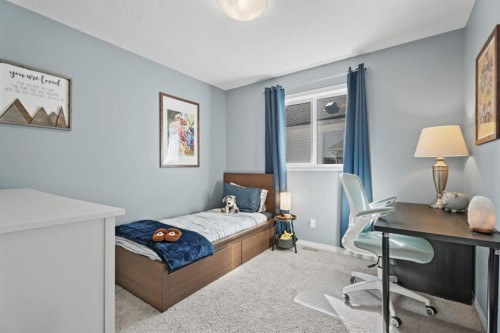 49 Kingsbridge Place Se, Airdrie, AB - Indoor Photo Showing Bedroom