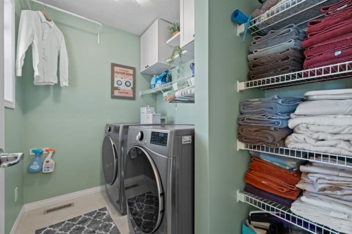 49 Kingsbridge Place Se, Airdrie, AB - Indoor Photo Showing Laundry Room