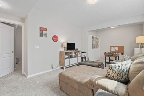49 Kingsbridge Place Se, Airdrie, AB - Indoor Photo Showing Bedroom