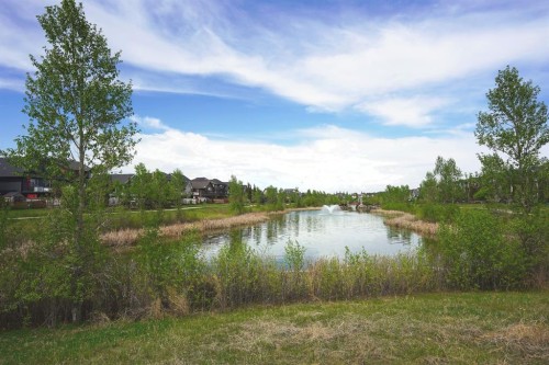 49 Kingsbridge Place Se, Airdrie, AB - Outdoor With Body Of Water With View