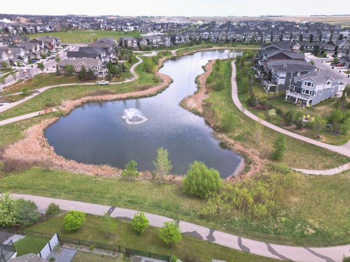49 Kingsbridge Place Se, Airdrie, AB - Outdoor With Body Of Water With View