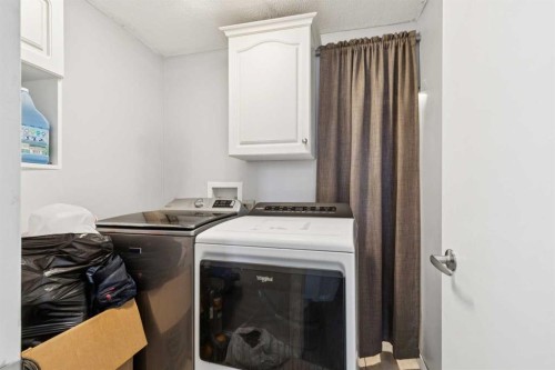 28 Templegreen Bay Ne, Calgary, AB - Indoor Photo Showing Laundry Room