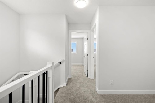 106 Sora Gardens Se, Calgary, AB - Indoor Photo Showing Other Room