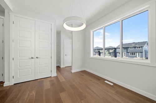 106 Sora Gardens Se, Calgary, AB - Indoor Photo Showing Other Room