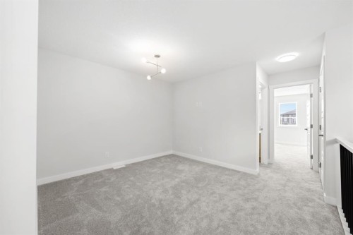 106 Sora Gardens Se, Calgary, AB - Indoor Photo Showing Other Room