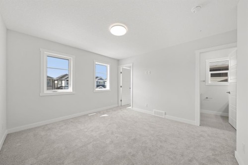 106 Sora Gardens Se, Calgary, AB - Indoor Photo Showing Other Room