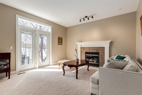 72 Wentworth Crescent Sw, Calgary, AB - Indoor Photo Showing Living Room With Fireplace