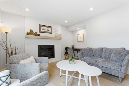 832 Edgemont Road Nw, Calgary, AB - Indoor Photo Showing Living Room With Fireplace