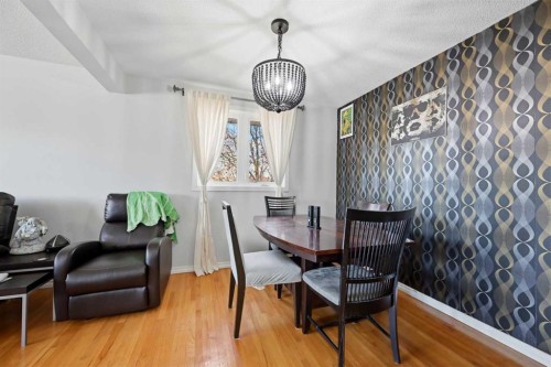 1012 Riddell Place Se, Calgary, AB - Indoor Photo Showing Dining Room