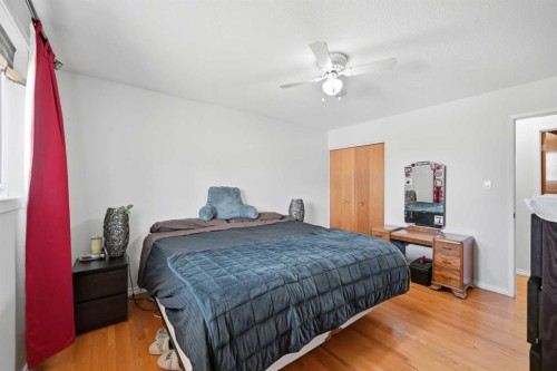 1012 Riddell Place Se, Calgary, AB - Indoor Photo Showing Bedroom