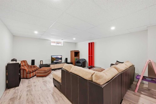 1012 Riddell Place Se, Calgary, AB - Indoor Photo Showing Basement
