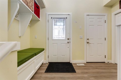 140 Emberside Glen, Cochrane, AB - Indoor Photo Showing Other Room