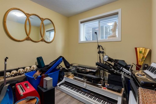140 Emberside Glen, Cochrane, AB - Indoor Photo Showing Other Room