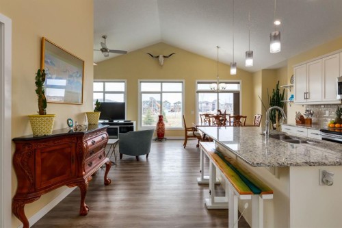 140 Emberside Glen, Cochrane, AB - Indoor Photo Showing Kitchen