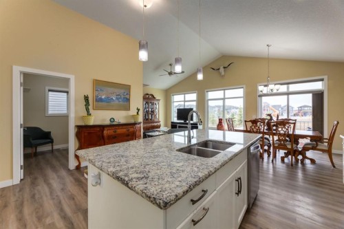 140 Emberside Glen, Cochrane, AB - Indoor Photo Showing Kitchen With Double Sink