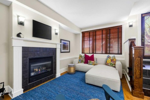 650 29 Avenue Nw, Calgary, AB - Indoor Photo Showing Living Room With Fireplace