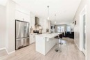 140 Howse Avenue Ne, Calgary, AB  - Indoor Photo Showing Kitchen With Stainless Steel Kitchen With Upgraded Kitchen 