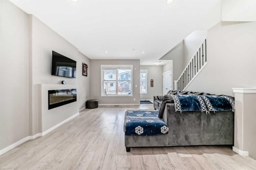 140 Howse Avenue Ne, Calgary, AB - Indoor With Fireplace