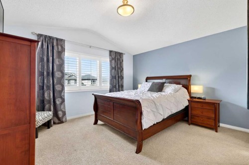 27 Copperpond Heights Se, Calgary, AB - Indoor Photo Showing Bedroom