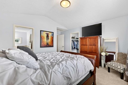 27 Copperpond Heights Se, Calgary, AB - Indoor Photo Showing Bedroom