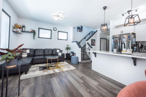 27 Sage Hill Common Nw, Calgary, AB - Indoor Photo Showing Living Room