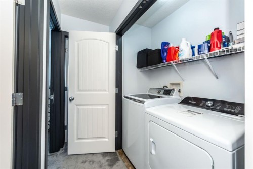 27 Sage Hill Common Nw, Calgary, AB - Indoor Photo Showing Laundry Room