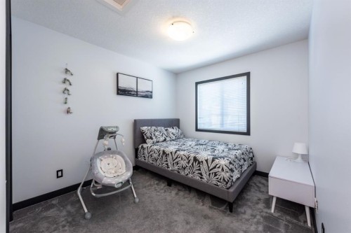 27 Sage Hill Common Nw, Calgary, AB - Indoor Photo Showing Bedroom